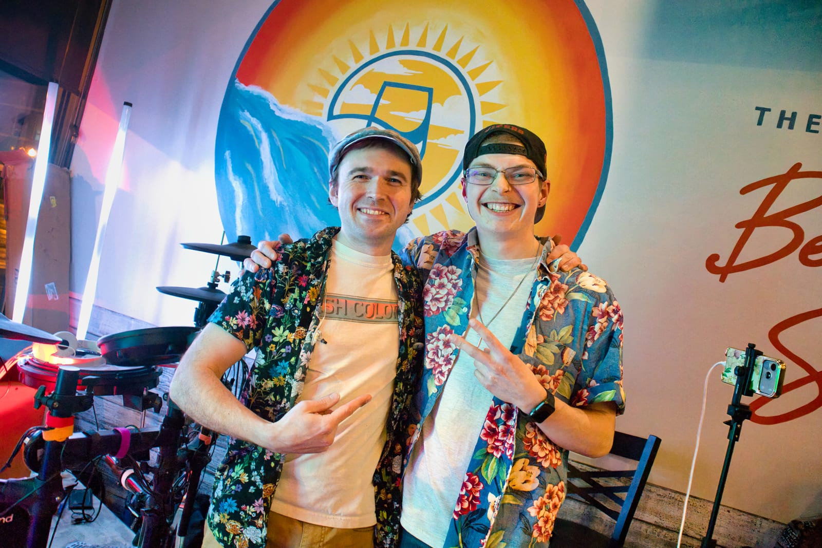 Stephen Michael and Jake Long smiling together at a COAST performance